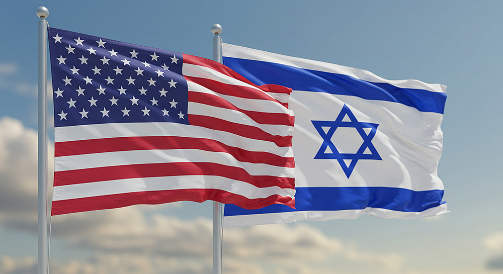United States and Israeli flags displayed together.